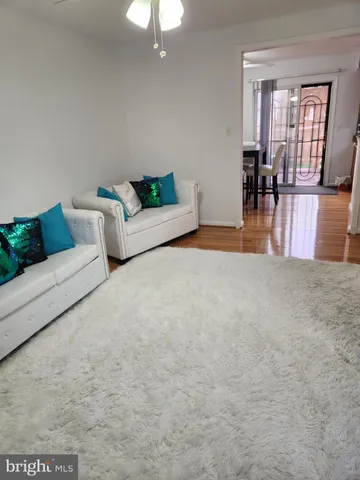 a view of livingroom with furniture and chandelier