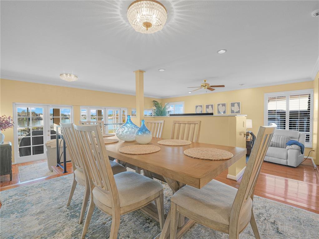 3 Casa Loma Way, Unit 3 Lakeland, FL 33813 - Photo 11 of 45 a view of a dining room with furniture and wooden floor