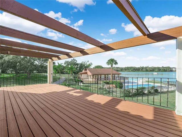 a view of swimming pool with deck and outdoor space