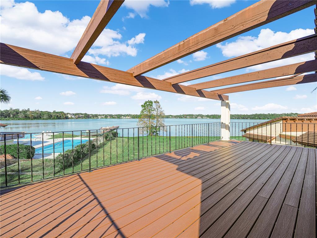 3 Casa Loma Way, Unit 3 Lakeland, FL 33813 - Photo 23 of 45 a view of swimming pool with outdoor seating and city view