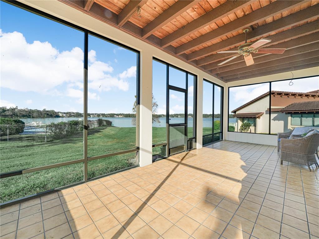 3 Casa Loma Way, Unit 3 Lakeland, FL 33813 - Photo 30 of 45 a view of swimming pool with a yard