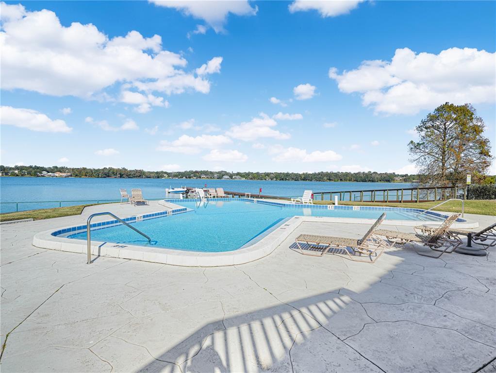 3 Casa Loma Way, Unit 3 Lakeland, FL 33813 - Photo 38 of 45 a view of a swimming pool and lake view