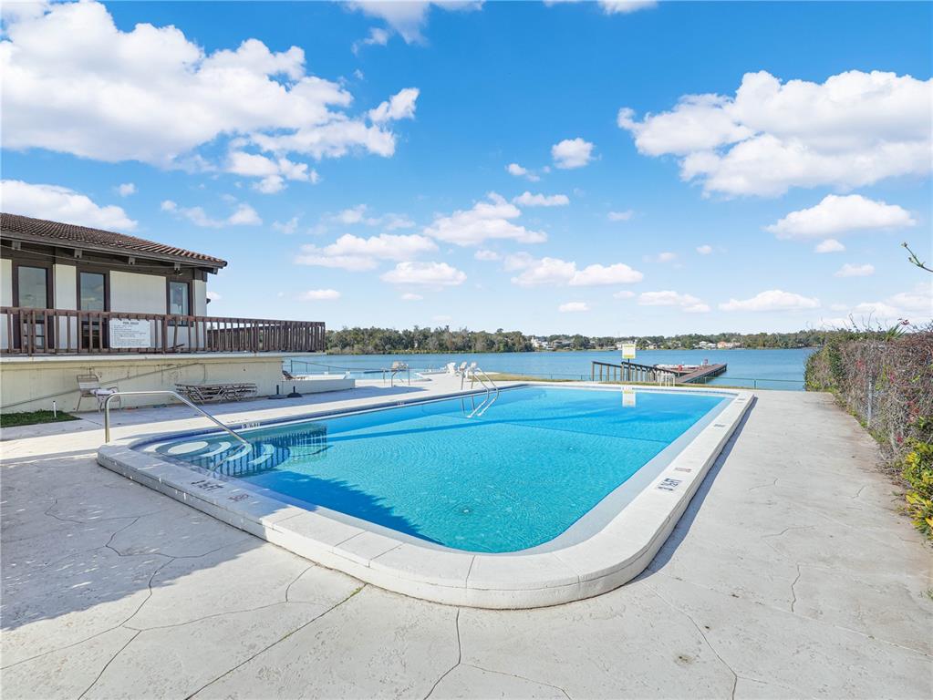 3 Casa Loma Way, Unit 3 Lakeland, FL 33813 - Photo 39 of 45 a view of a swimming pool with a lounge chair