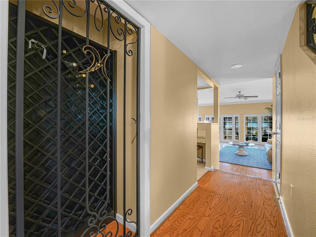 3 Casa Loma Way, Unit 3 Lakeland, FL 33813 - Photo 4 of 45 a view of a hallway with closet and a couch