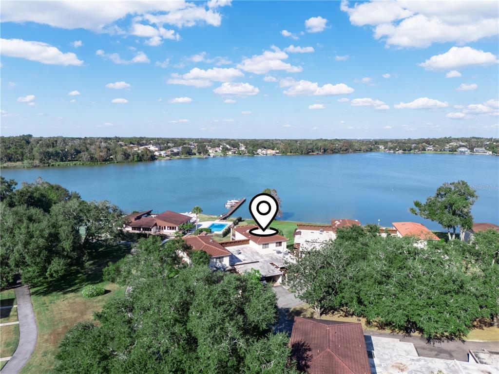 3 Casa Loma Way, Unit 3 Lakeland, FL 33813 - Photo 44 of 45 a view of a lake top and mountain view