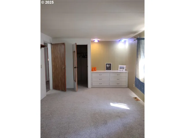 a view of a hallway with some room