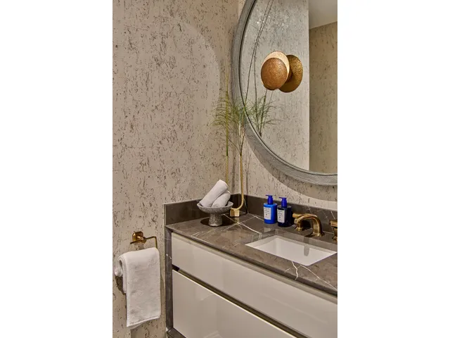 a kitchen with a table and chairs in it