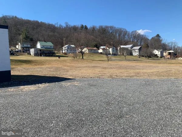 a view of road with houses