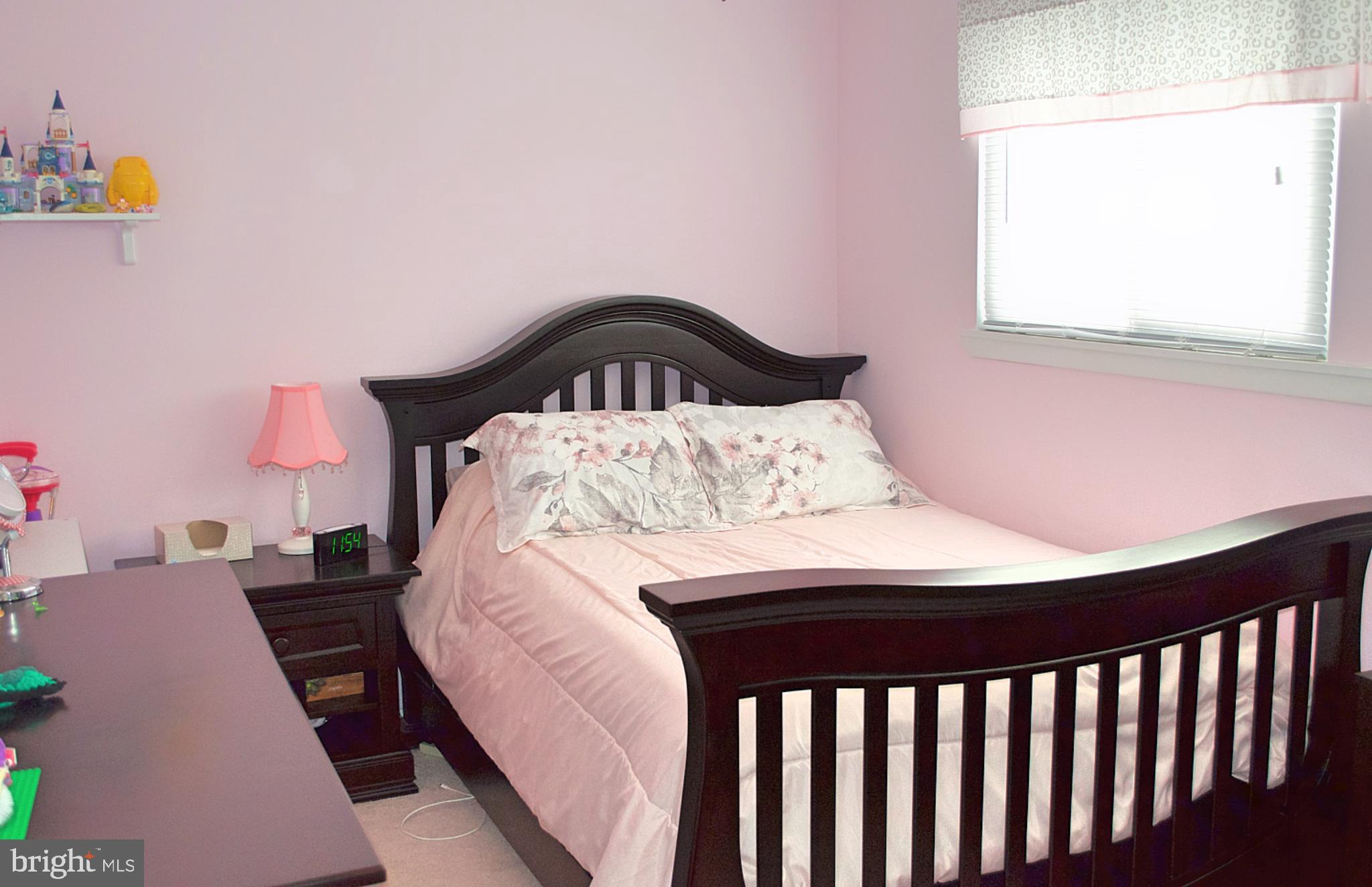 2 P Lake Drive East Windsor, NJ 08520 - Photo 8 of 11 a bedroom with a bed and a window