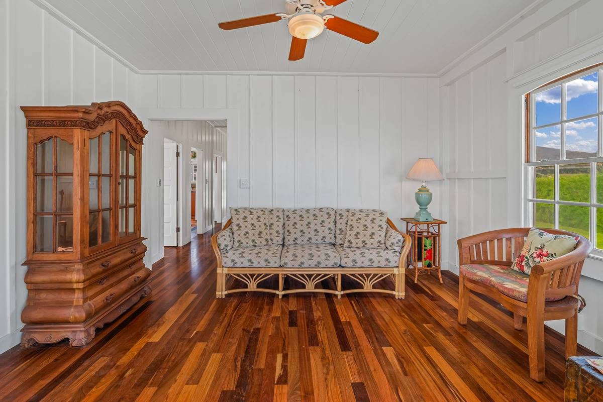 1085 Moanakai Road Kapaa, HI 96746 - Photo 18 of 24 a bedroom with furniture and a wooden floor