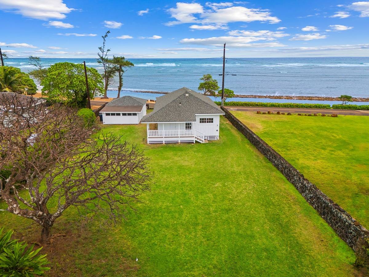 1085 Moanakai Road Kapaa, HI 96746 - Photo 20 of 24 a view of a house with a swimming pool