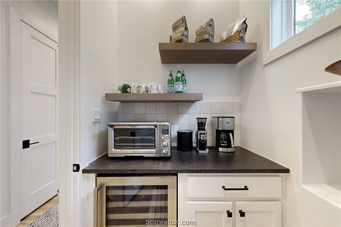 1629 Sawmill Road Franklin, TX 77856 - Photo 9 of 47 a kitchen with a stove and cabinets