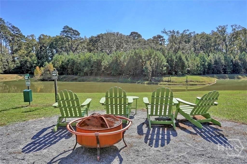 227 Durham Park Way Pooler, GA 31322 - Photo 28 of 31 Community Chairs Overlooking Lagoon