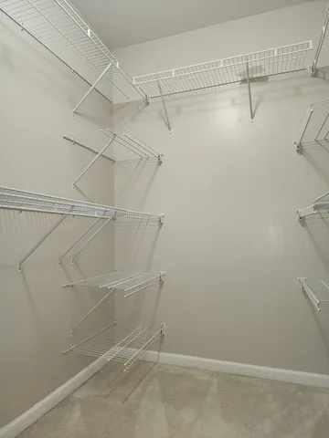 a view of a room with racks on the wall