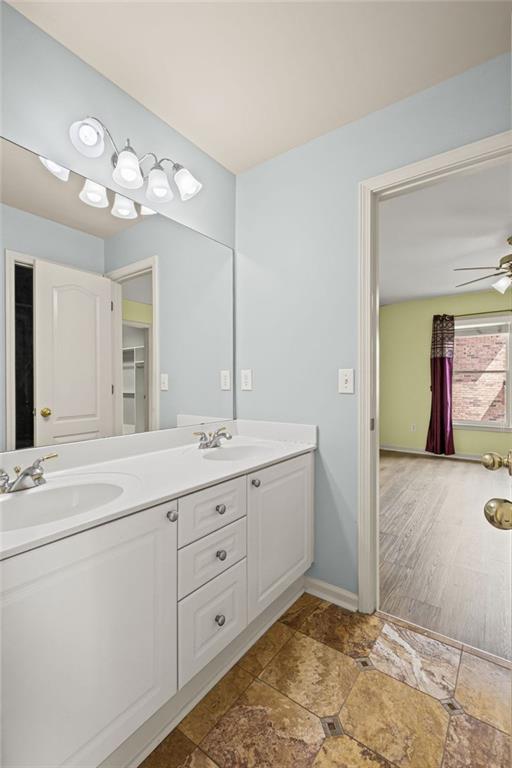 12857 Waterside Drive Alpharetta, GA 30004 - Photo 31 of 60 a spacious bathroom with a granite countertop sink a mirror and a shower