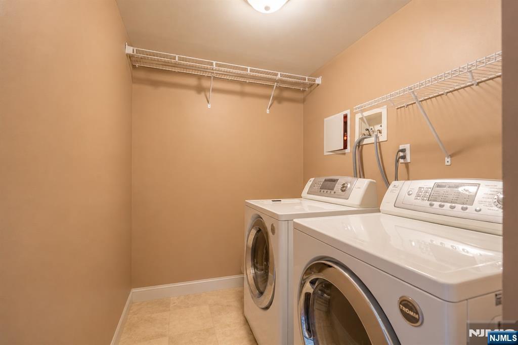 55 Marcia Road Ringwood, NJ 07456 - Photo 27 of 42 a utility room with dryer and washer