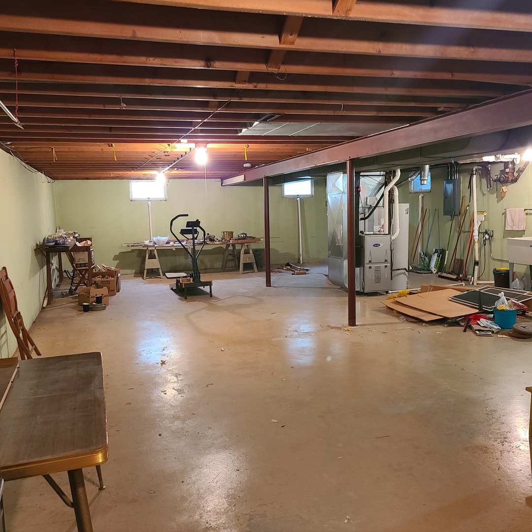 12N238 Hilltop Road Elgin, IL 60124 - Photo 17 of 21 a view of a room with gym equipment