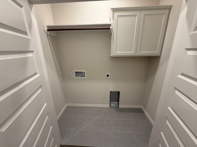 7804 Redbud Road Navasota, TX 77868 - Photo 11 of 25 a view of storage and utility room with washer and dryer