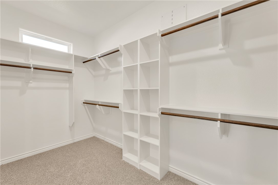 7804 Redbud Road Navasota, TX 77868 - Photo 15 of 26 a view of an empty walk in closet