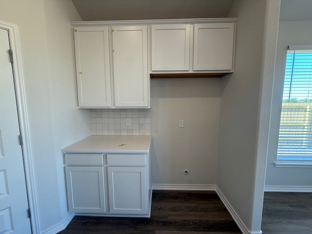 7804 Redbud Road Navasota, TX 77868 - Photo 18 of 25 a view of cabinets and wooden floor