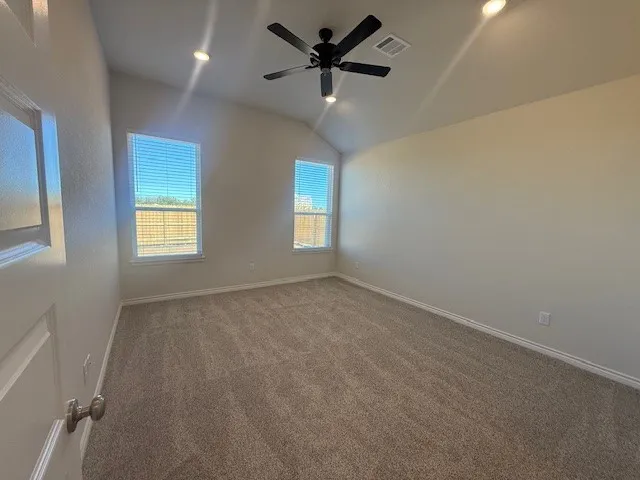 a view of cabinets and wooden floor