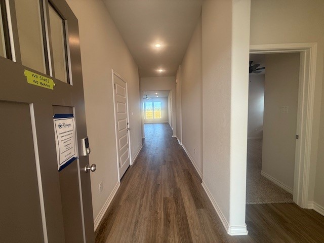 7804 Redbud Road Navasota, TX 77868 - Photo 2 of 25 a view of a hallway with wooden floor and staircase