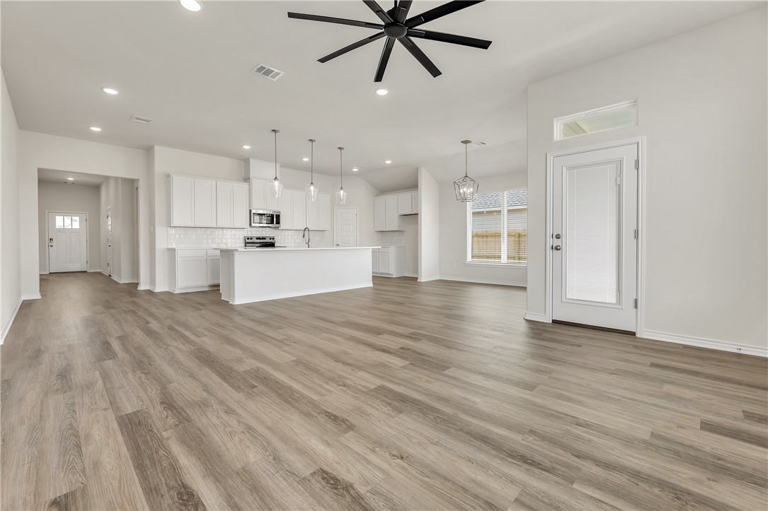 7804 Redbud Road Navasota, TX 77868 - Photo 3 of 26 a view of an empty room and kitchen view