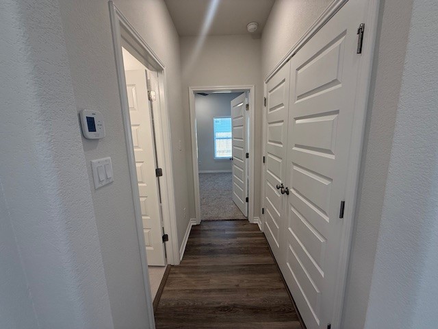7804 Redbud Road Navasota, TX 77868 - Photo 8 of 25 a view of a hallway with a wooden door