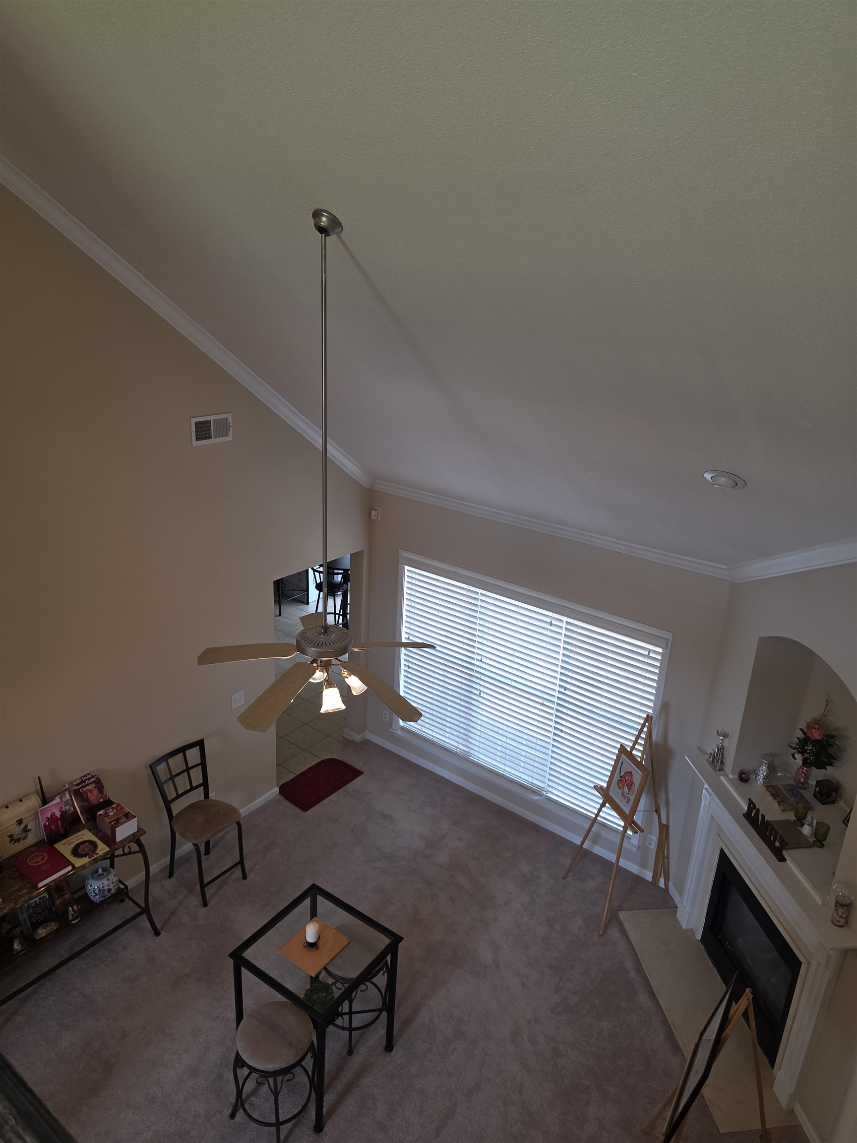 7253 Rourke Circle Memphis, TN 38125 - Photo 25 of 31 Vaulted ceiling with crown molding and a ceiling fan light fixture
