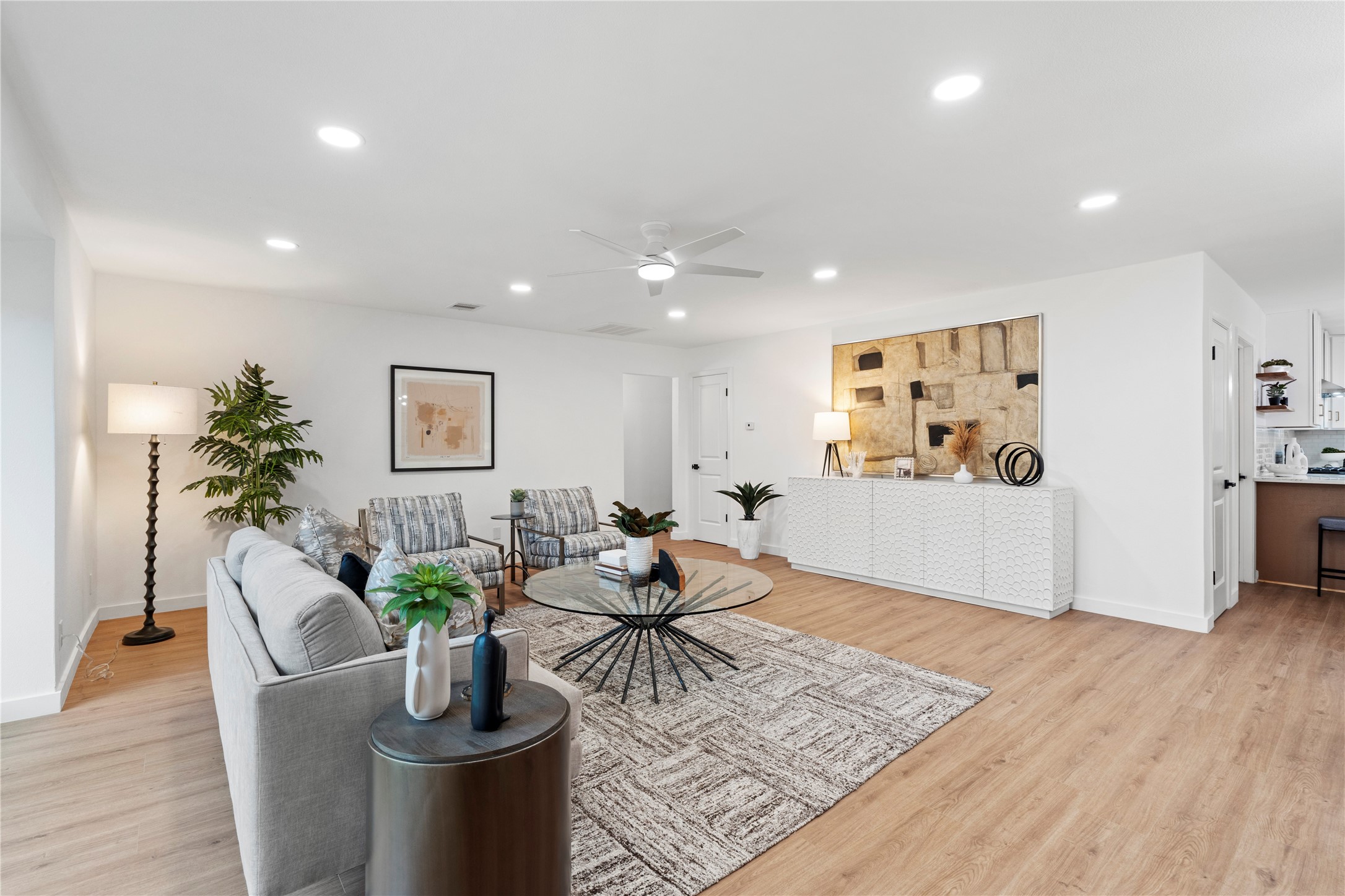 5023 Redstart Street Houston, TX 77035 - Photo 34 of 34 The expansive open-concept floor plan is bathed in natural light, offering a seamless flow that is perfect for hosting large gatherings.