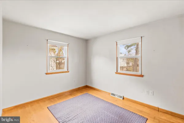 a room with a bed and a window