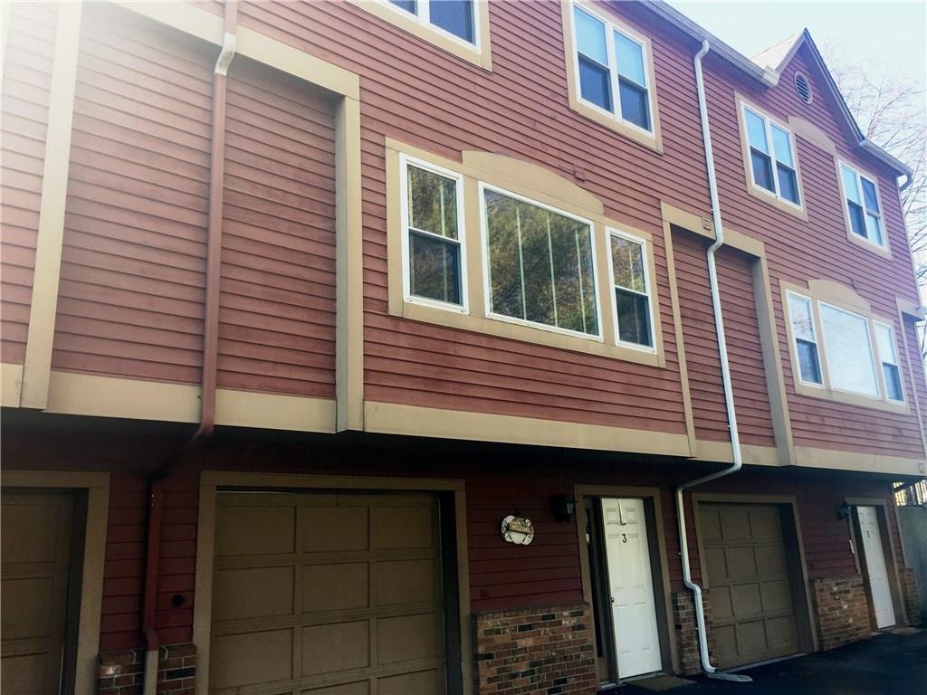 6 Rowan Street, Unit 3 Norwalk, CT 06855 - Photo 1 of 1 a view of a building with a window and balcony