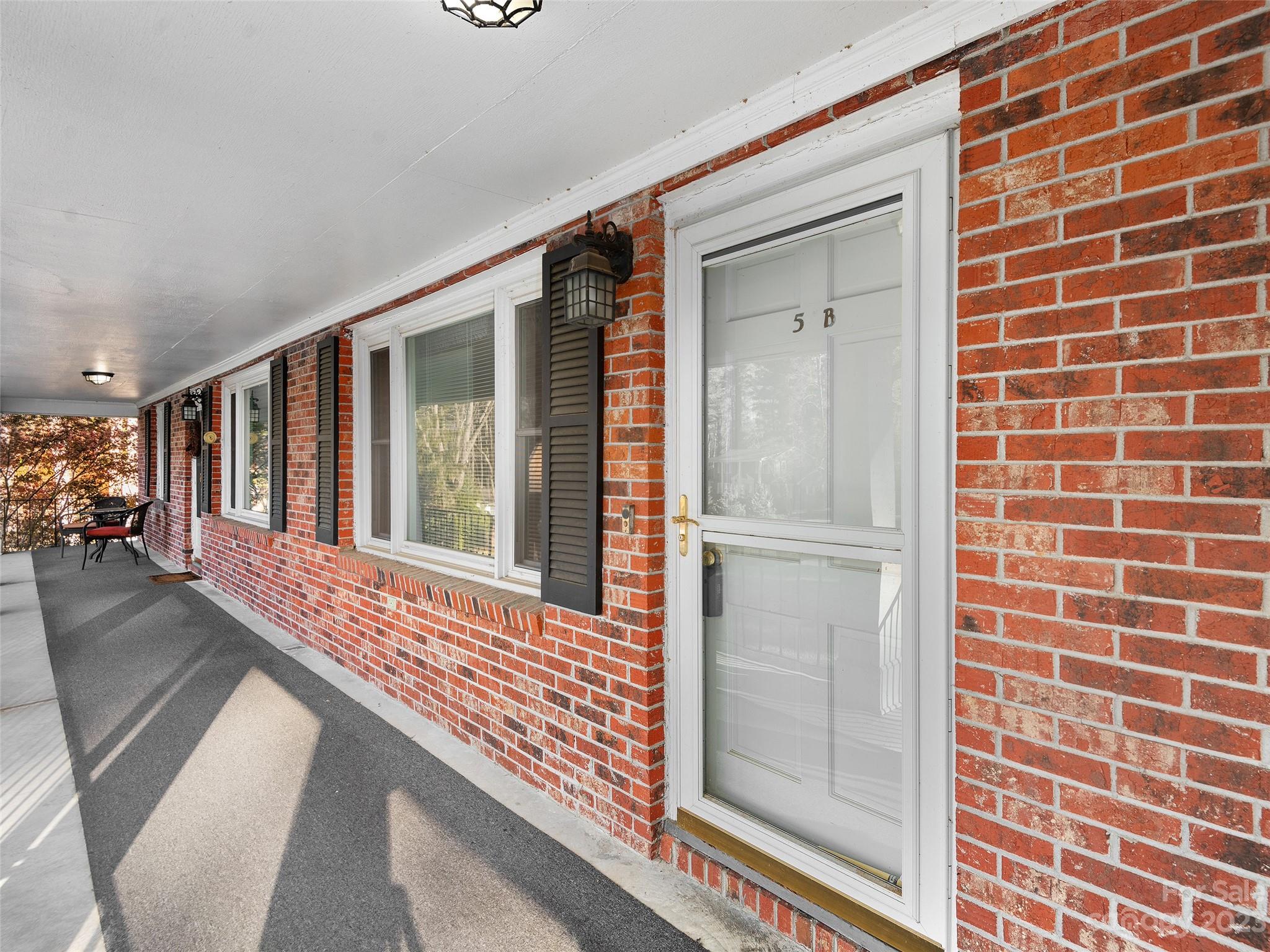 102 Boyd Drive, Unit 5B Flat Rock, NC 28731 - Photo 2 of 16 a view of front door of house