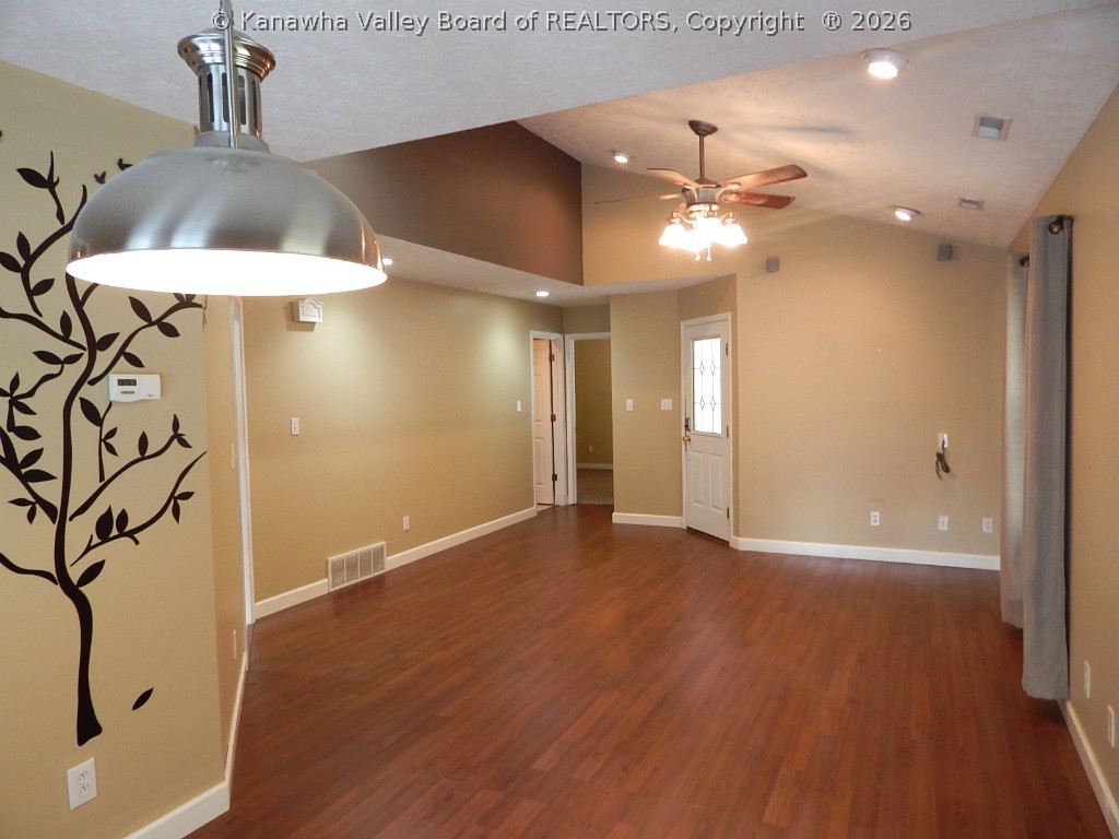 349 Bluelick Road Winfield, WV 25213 - Photo 11 of 28 DINING AREA AND LIVING. LOTS OF WINDOWS W/CUSTOM BLINDS.