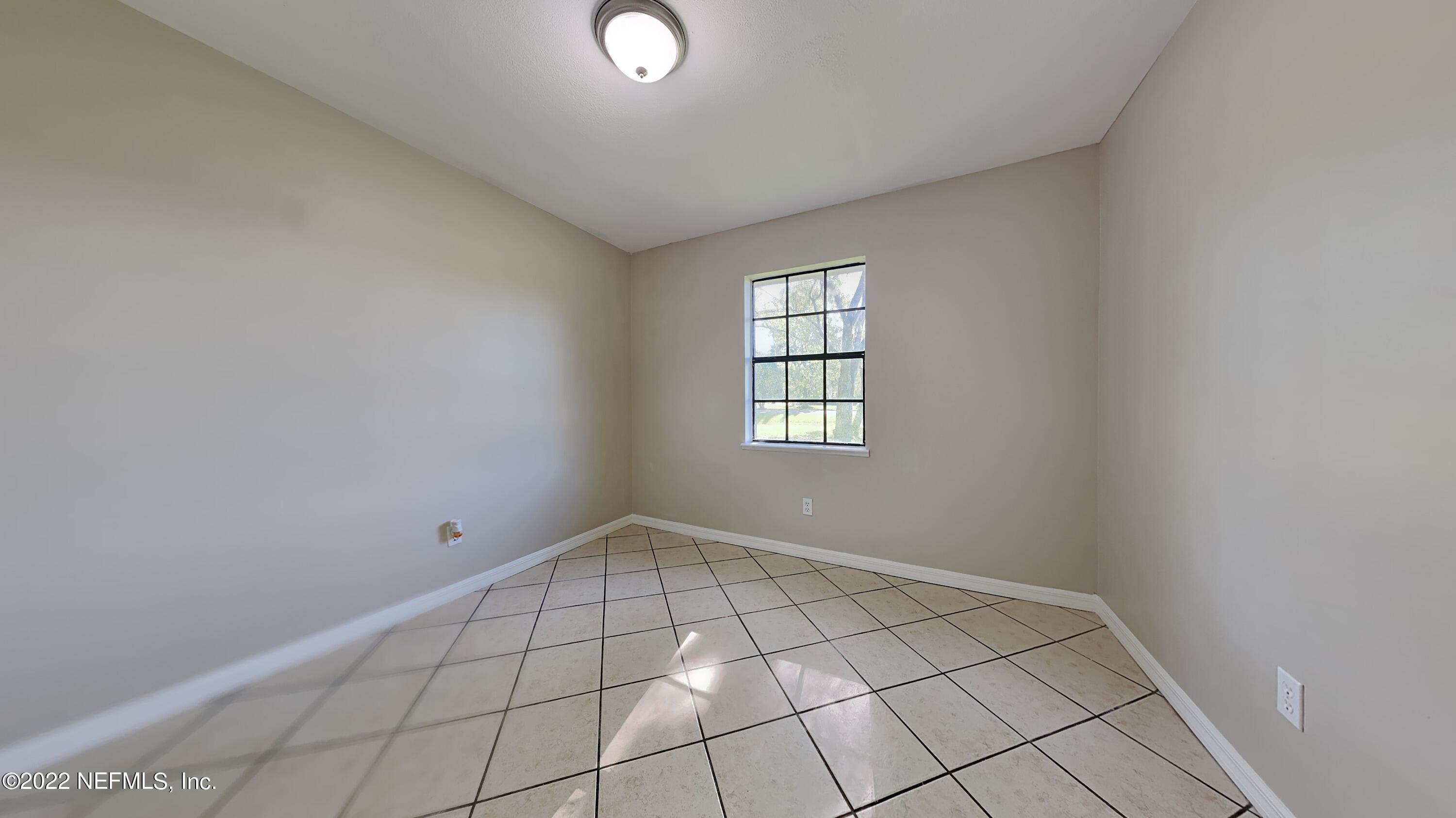 54189 Vikki Road Callahan, FL 32011 - Photo 14 of 18 an empty room with windows