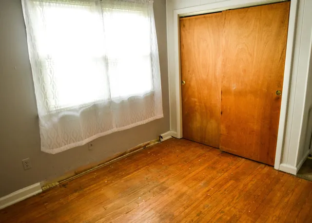 a kitchen with stainless steel appliances a refrigerator and a stove