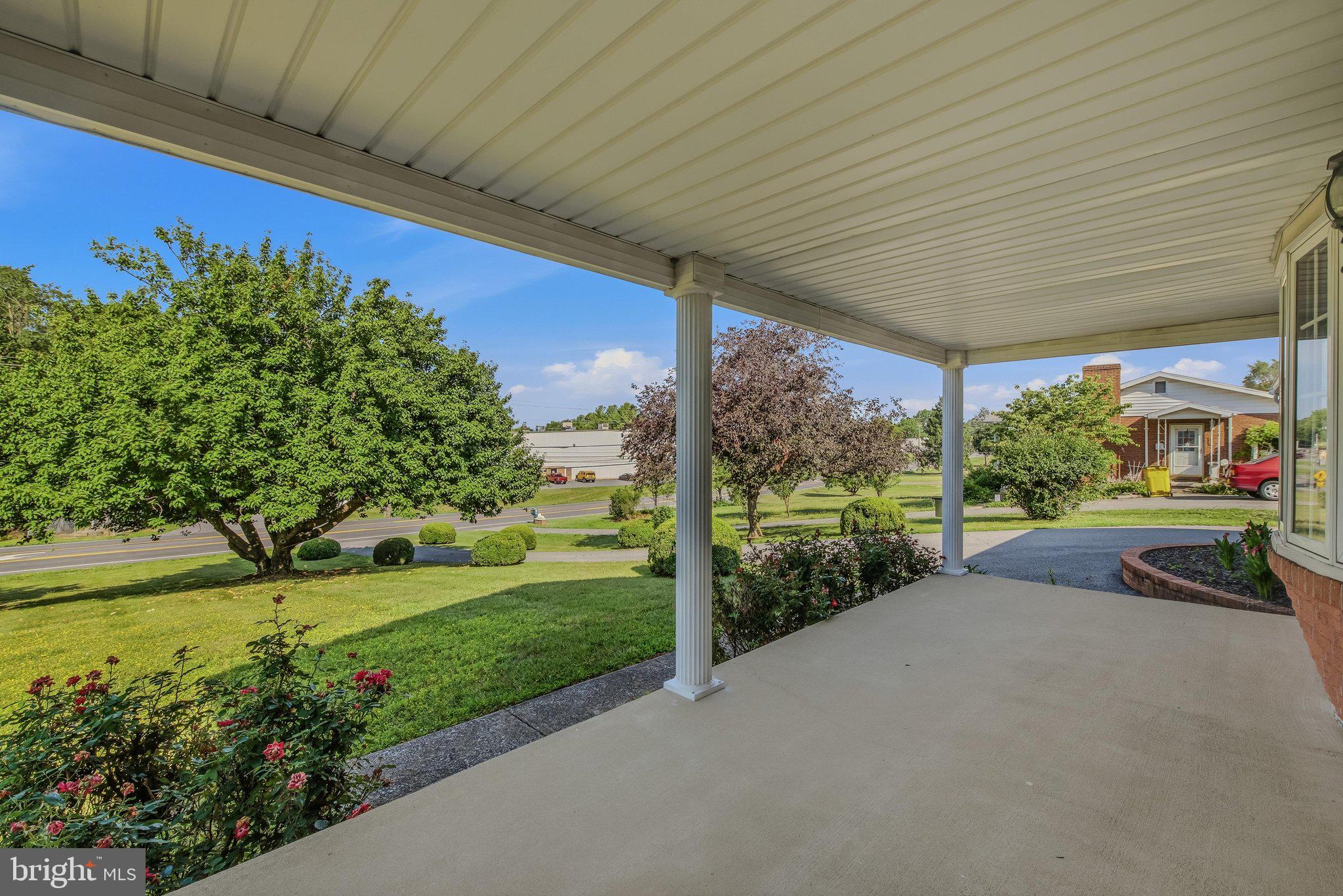 3203 Charles Town Road Kearneysville, WV 25430 - Photo 5 of 45 Large, covered front porch to take in the views