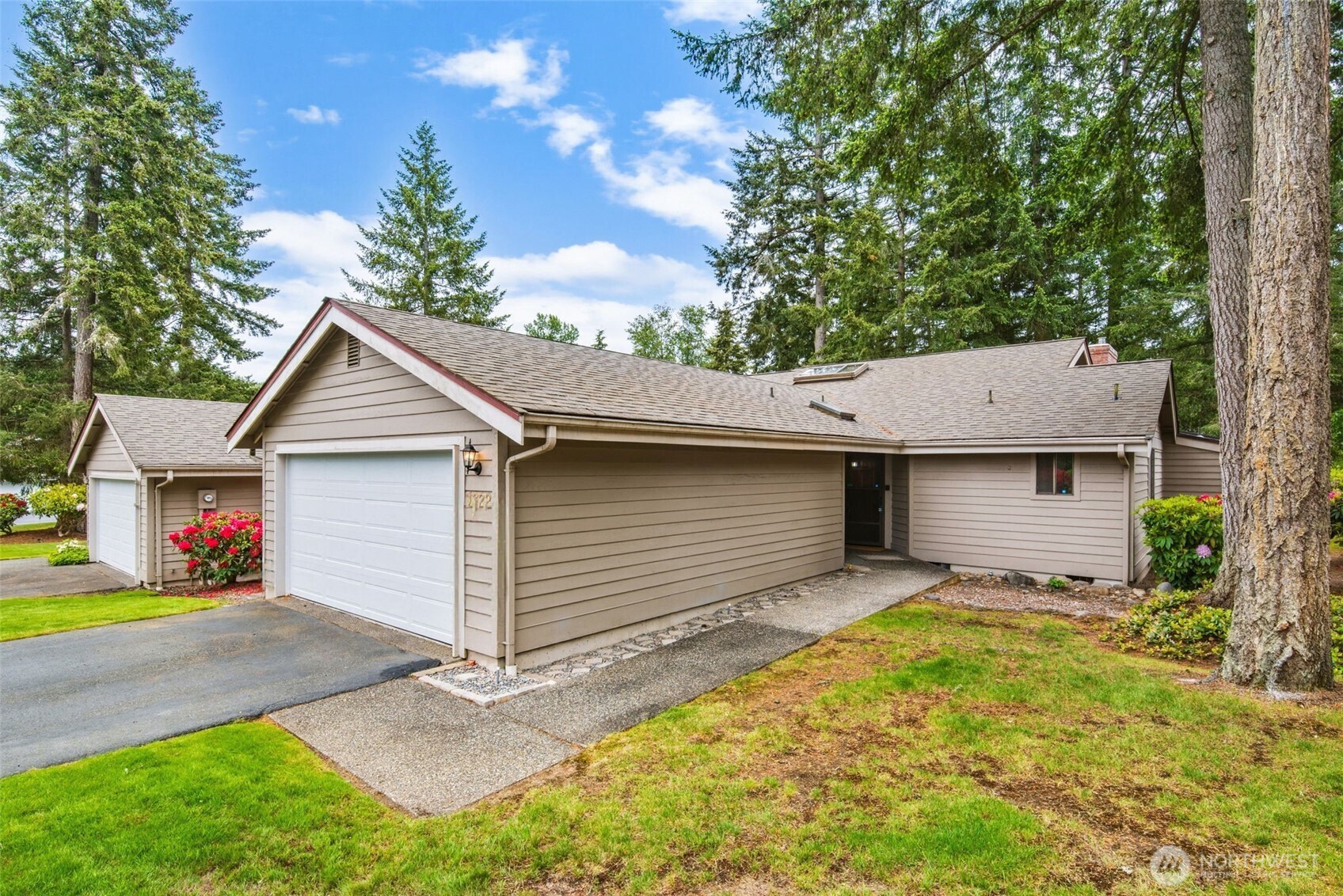 1322 Boise Street Fircrest, WA 98466 - Photo 2 of 40 a view of a house with a yard and garage