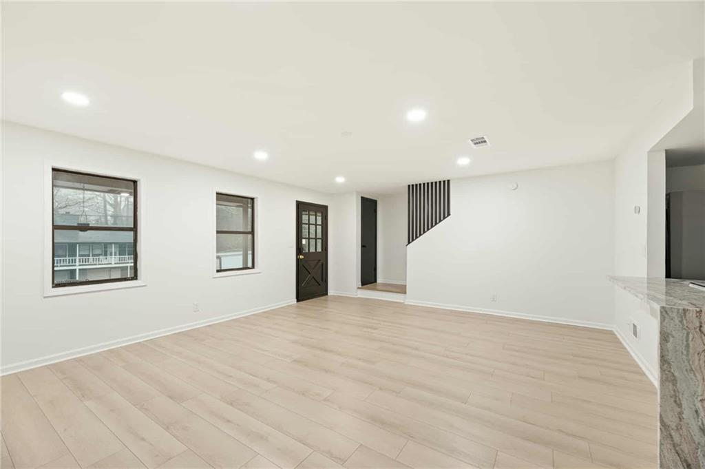 1487 Springwood Drive Southeast, Unit A Smyrna, GA 30080 - Photo 18 of 19 a view of an empty room with a window