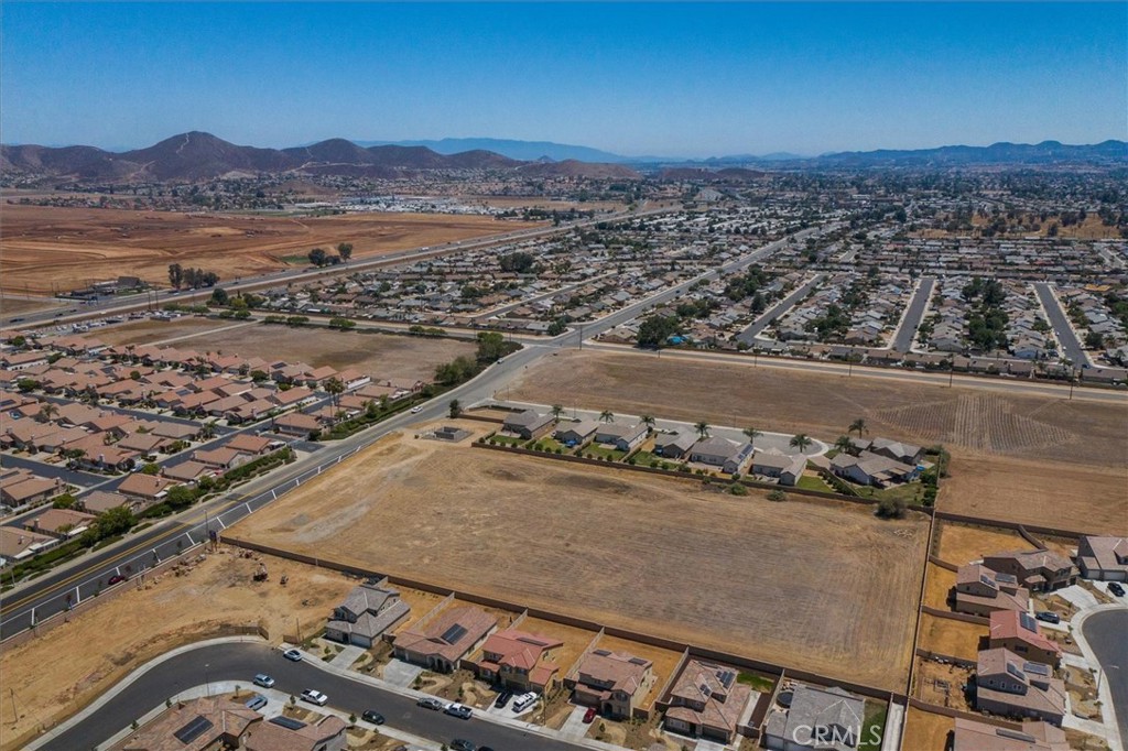 1246 Barnett Road Menifee, CA 92585 - Photo 16 of 19 an aerial view of residential houses with outdoor space