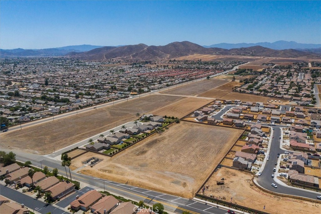1246 Barnett Road Menifee, CA 92585 - Photo 4 of 19 an aerial view of residential houses with outdoor space