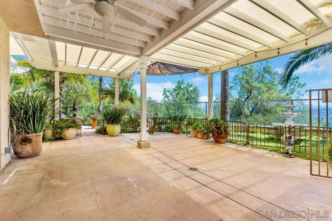 10496 Chaparral Drive Santee, CA 92071 - Photo 51 of 73 a view of a backyard with plants and a patio