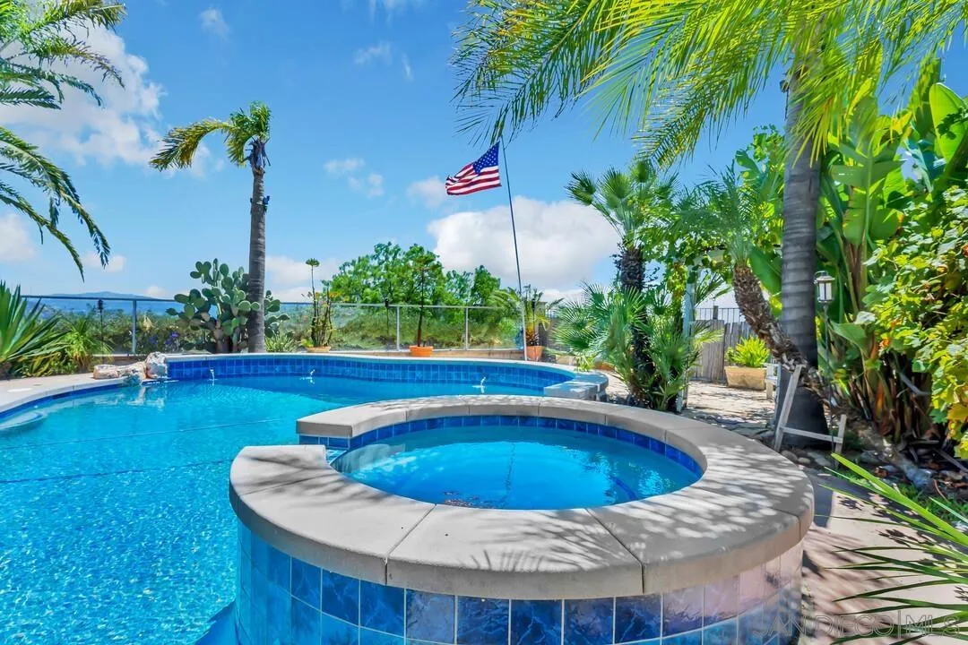 10496 Chaparral Drive Santee, CA 92071 - Photo 60 of 73 a view of a swimming pool with a patio