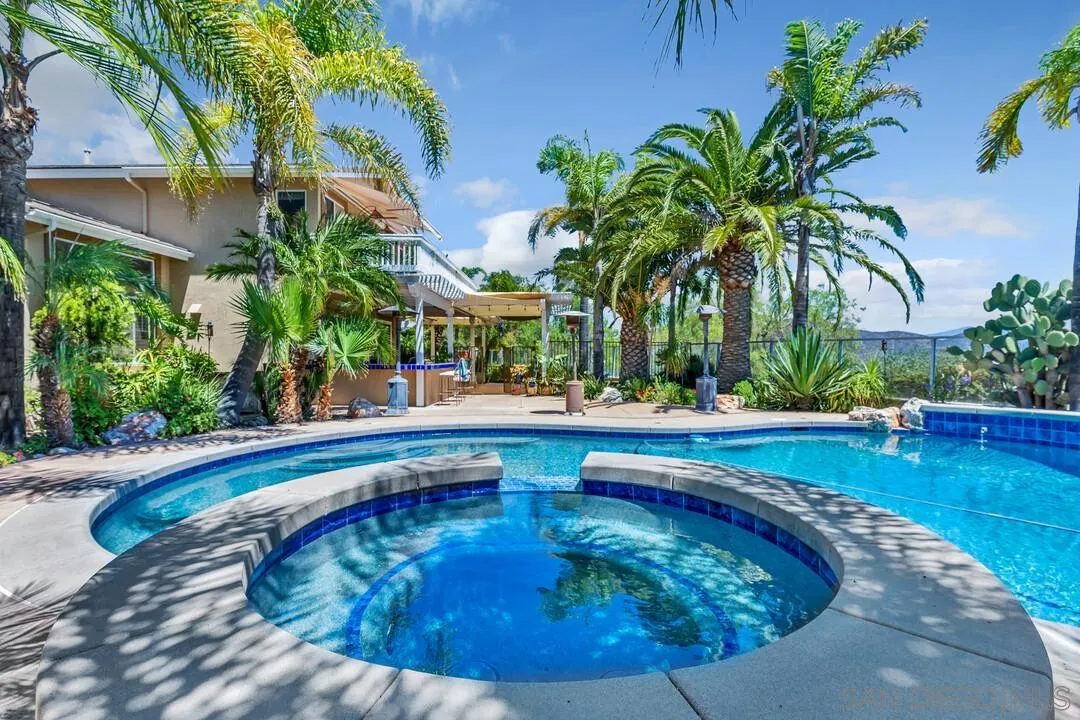 10496 Chaparral Drive Santee, CA 92071 - Photo 61 of 73 a swimming pool with outdoor seating and yard