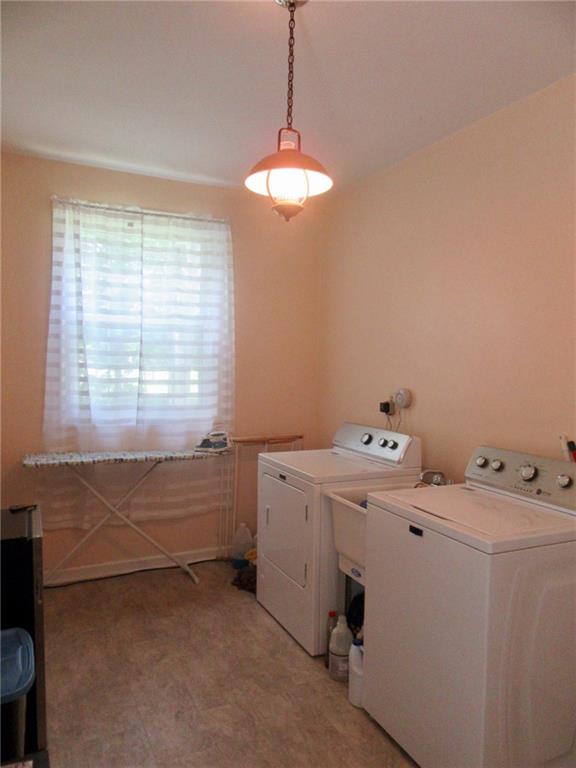 3995 Tuscarawas Road Beaver, PA 15009 - Photo 19 of 25 Spacious and Convenient! Laundry room doubles as room for coats and shoes.....opens from kitchen and to the deck......