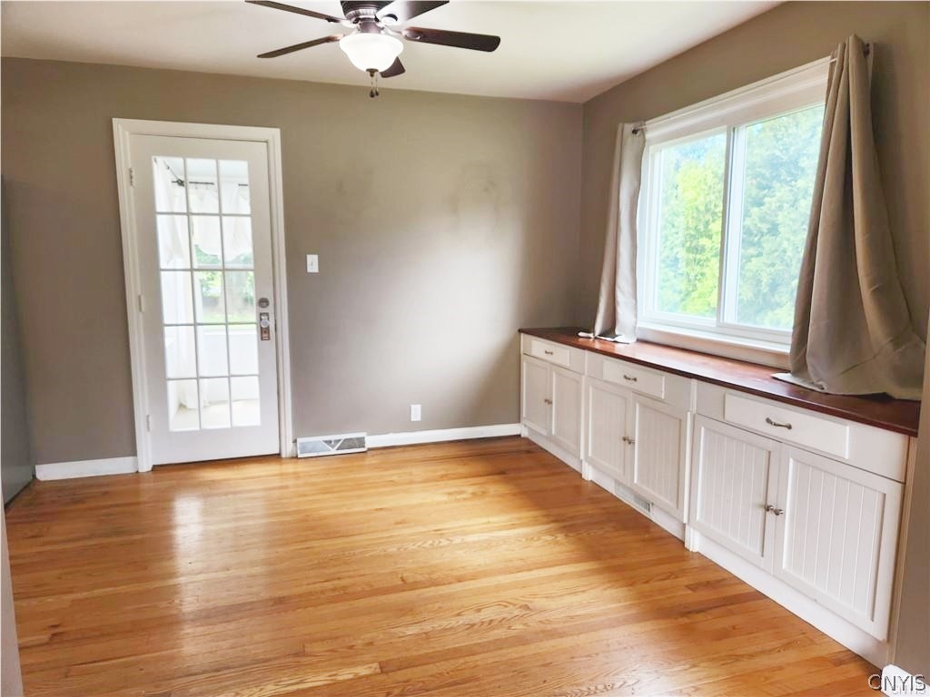 200 Windemere Road Syracuse, NY 13219 - Photo 8 of 29 Dining Room with access to the 3-Season Room