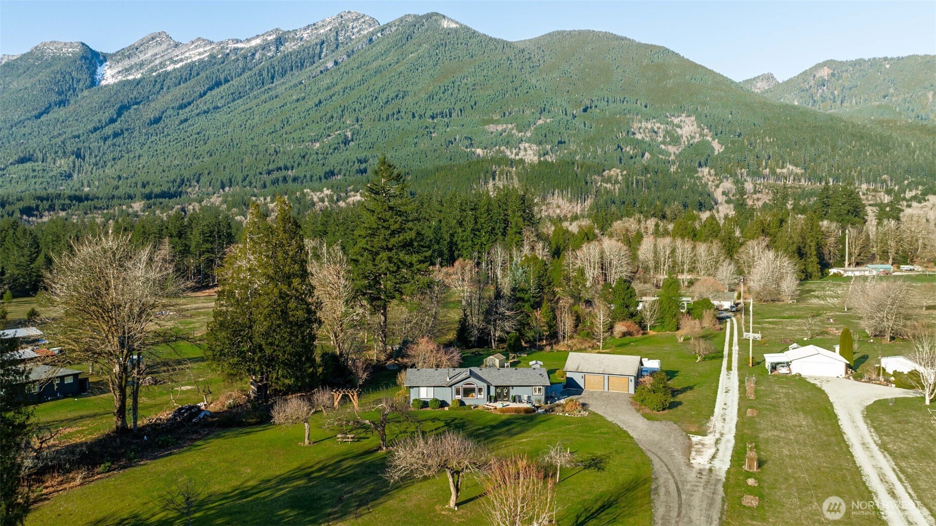 36721 Swede Heaven Road Arlington, WA 98223 - Photo 2 of 40 a view of a lake with a mountain in the background