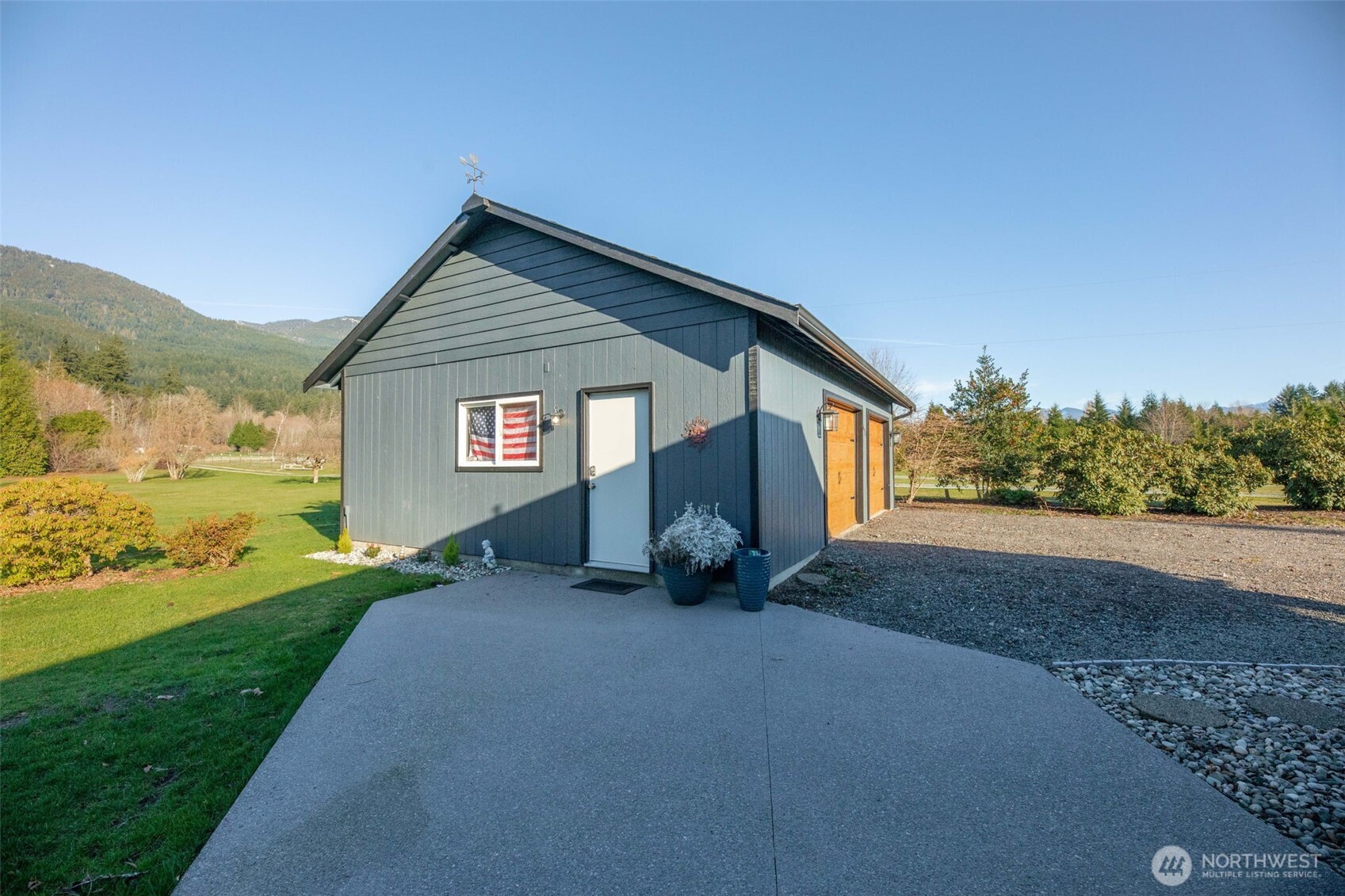 36721 Swede Heaven Road Arlington, WA 98223 - Photo 24 of 40 a view of a house with a yard