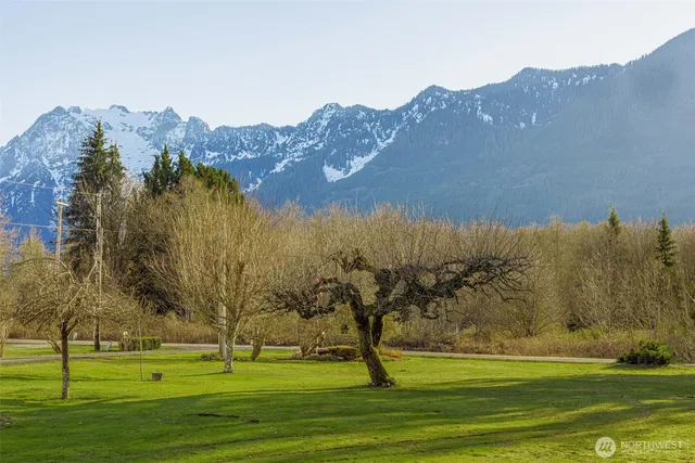 a view of a golf course with a lake