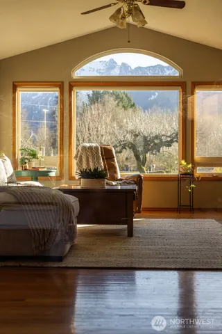 a living room with couch and a window